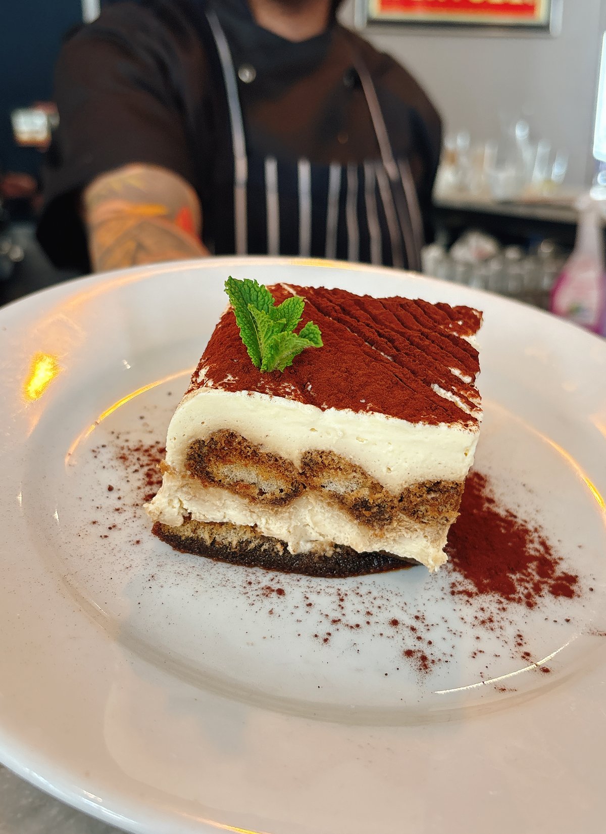 Tiramisu, the ultimate Ialian dessert: ladyfinger biscuits dipped in coffee and cream, flavoured with cocoa.
